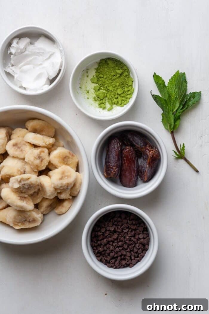 Ingredients for Mint Chocolate Chip Nice Cream on a wooden board