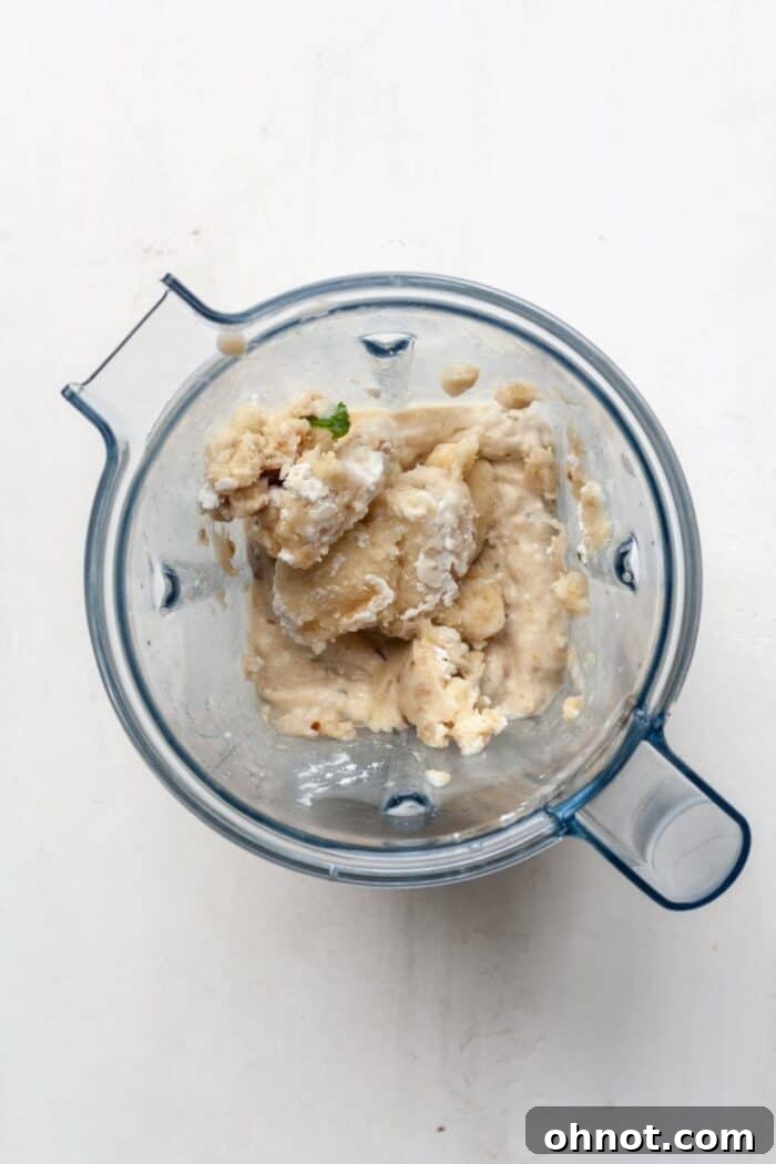 Frozen bananas in a blender before blending