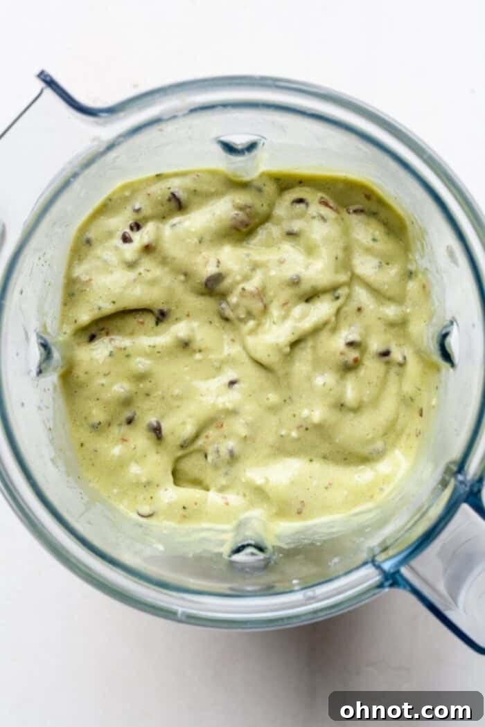 Green nice cream with mini chocolate chips folded in