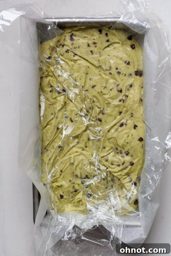 Pan of nice cream covered with plastic wrap for freezing