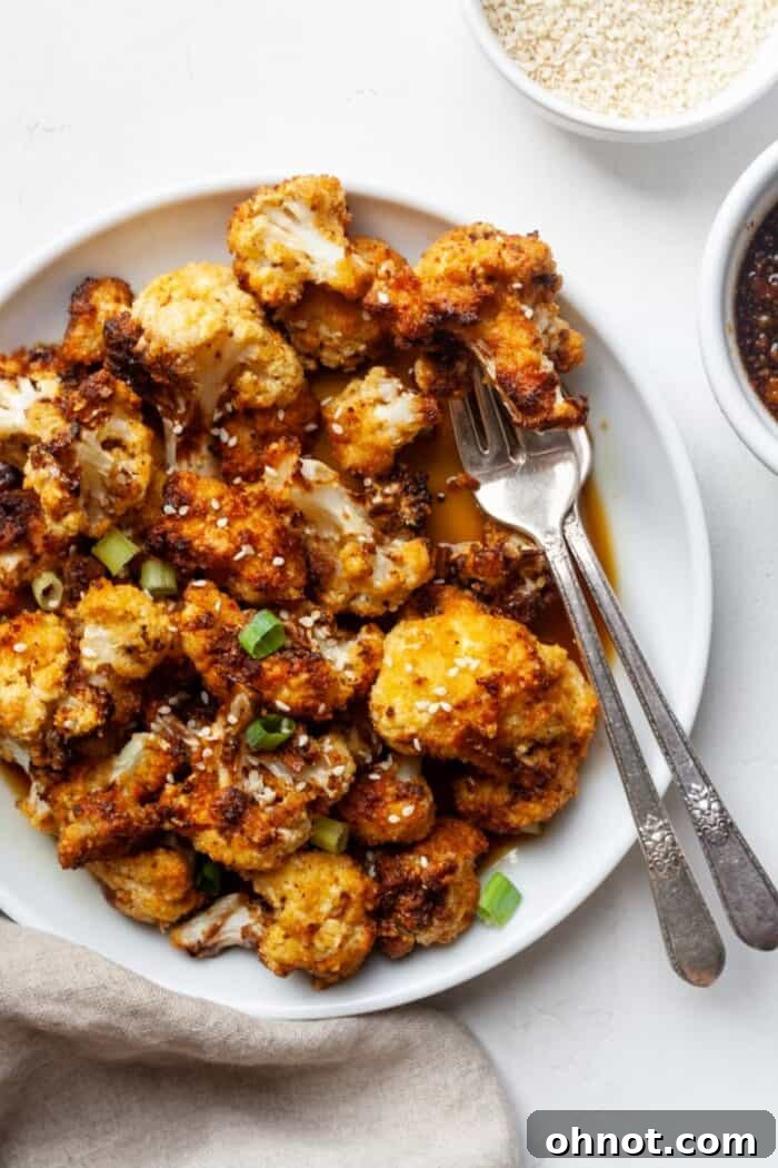 Teriyaki cauliflower bites on white plate
