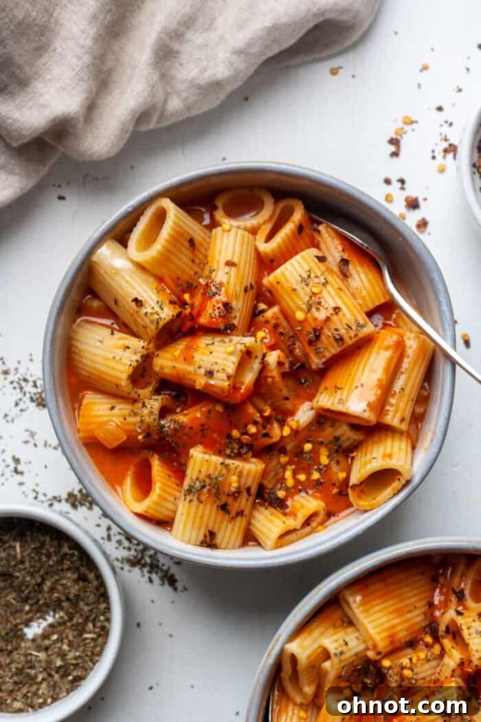 Coconut milk pasta sauce served with rigatoni in a bowl