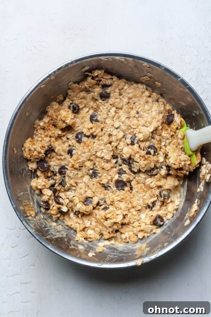 Healthy banana cookie dough in a bowl, fully mixed