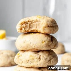 Stack of Vegan lemon cookies, enticingly golden