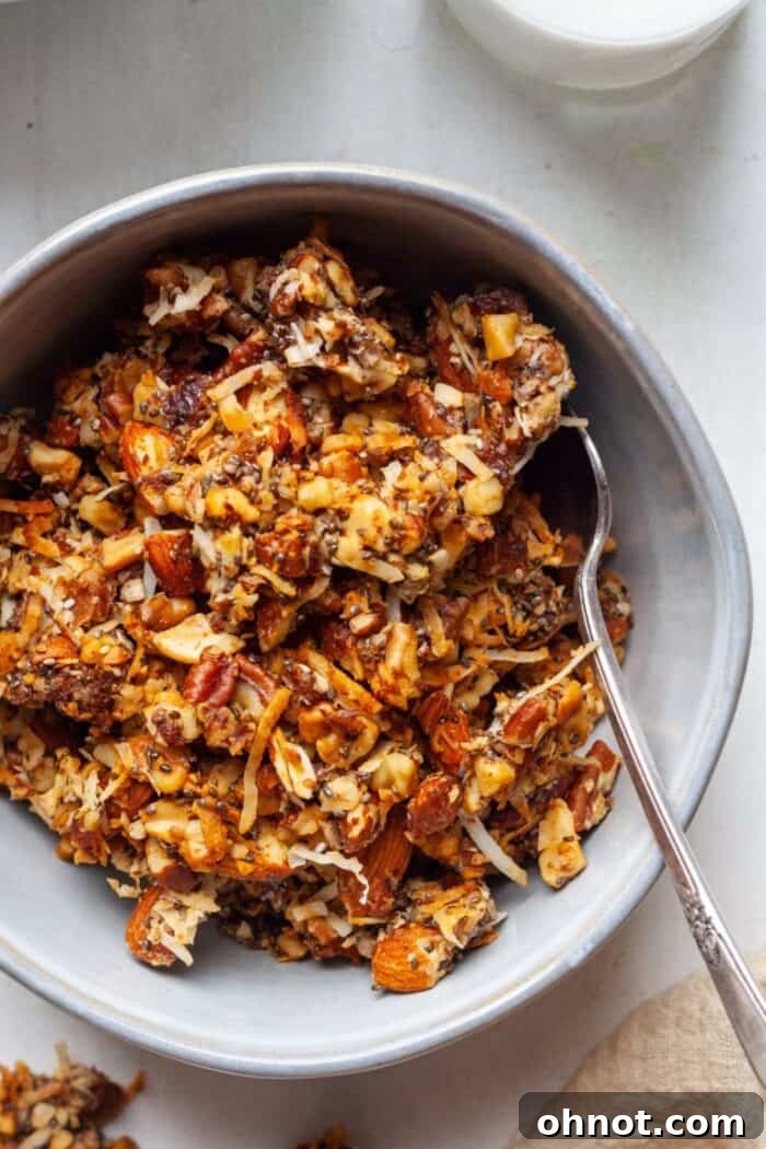 Whole30 approved granola in bowl with spoon, ready to be enjoyed as a healthy breakfast or snack