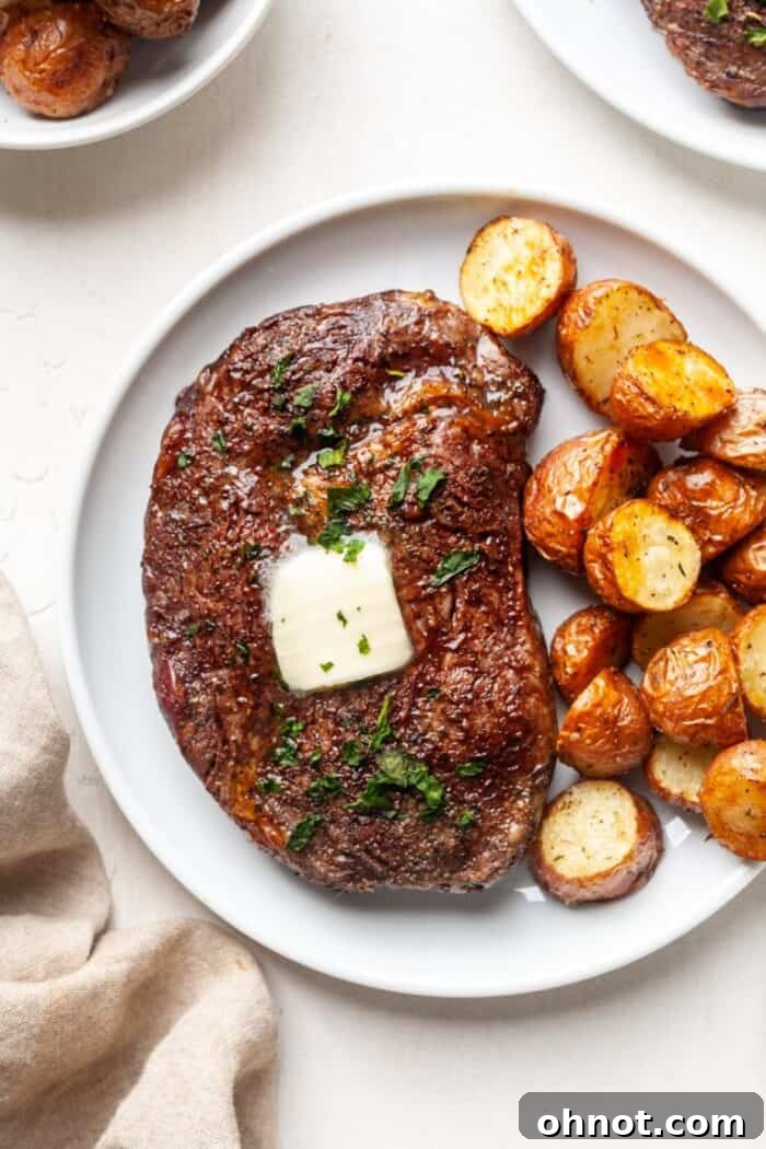 Air fryer ribeye steak, perfectly cooked and juicy, ready to serve