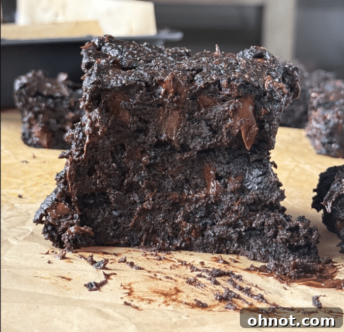 Stack of rich, melty sweet potato brownies, ready to be enjoyed.