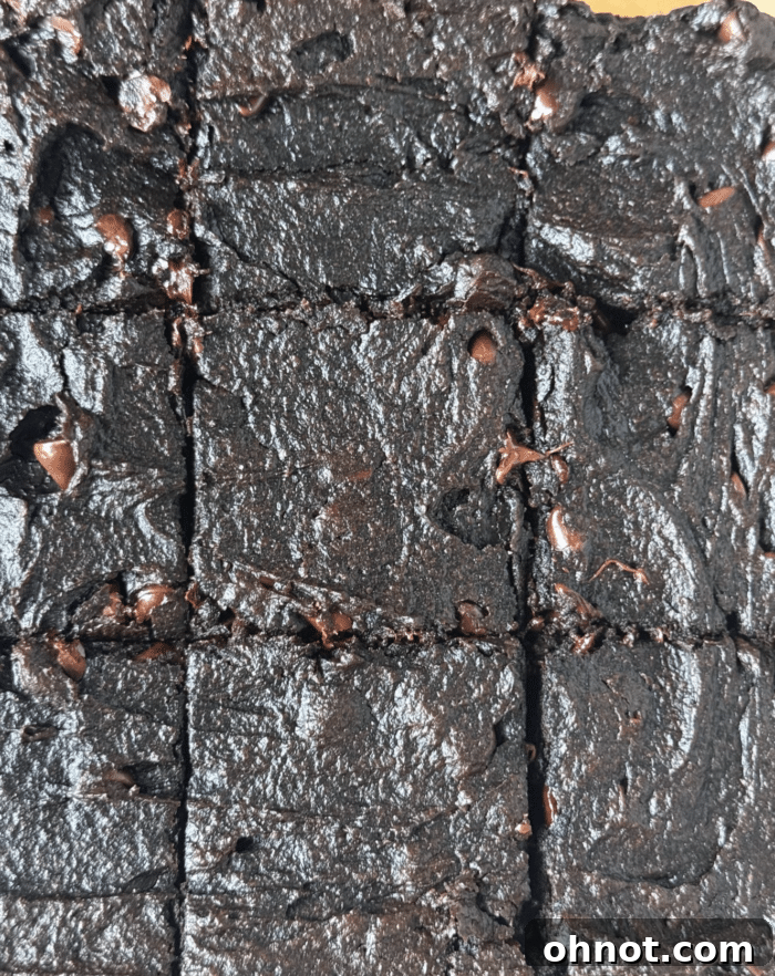 Perfectly sliced gooey chocolate bars of sweet potato protein brownies.