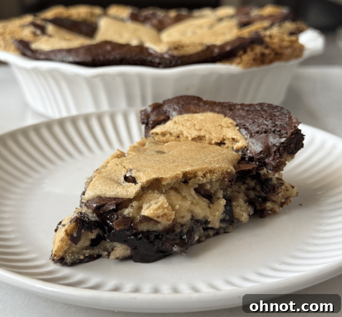 A single slice of Gluten-Free Brookie Pie, perfectly plated and ready to be enjoyed.