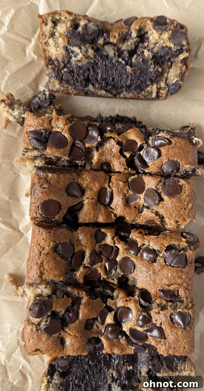 Close up of a slice of Brownie Banana Bread, showcasing the beautiful two-layered texture.