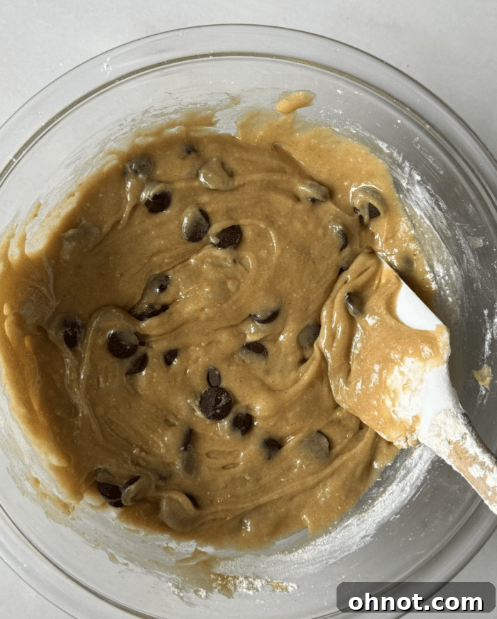 Creamy dough in glass bowl.