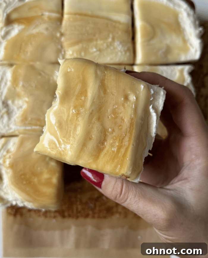 Thick frosting with hand.