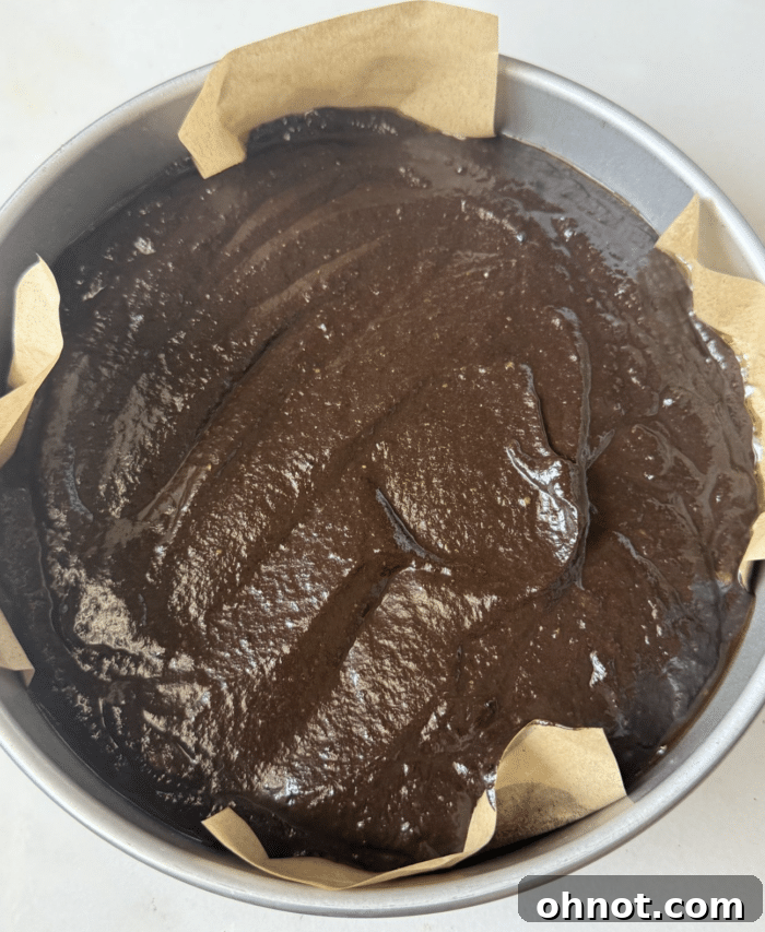 Brown batter in circle pan.