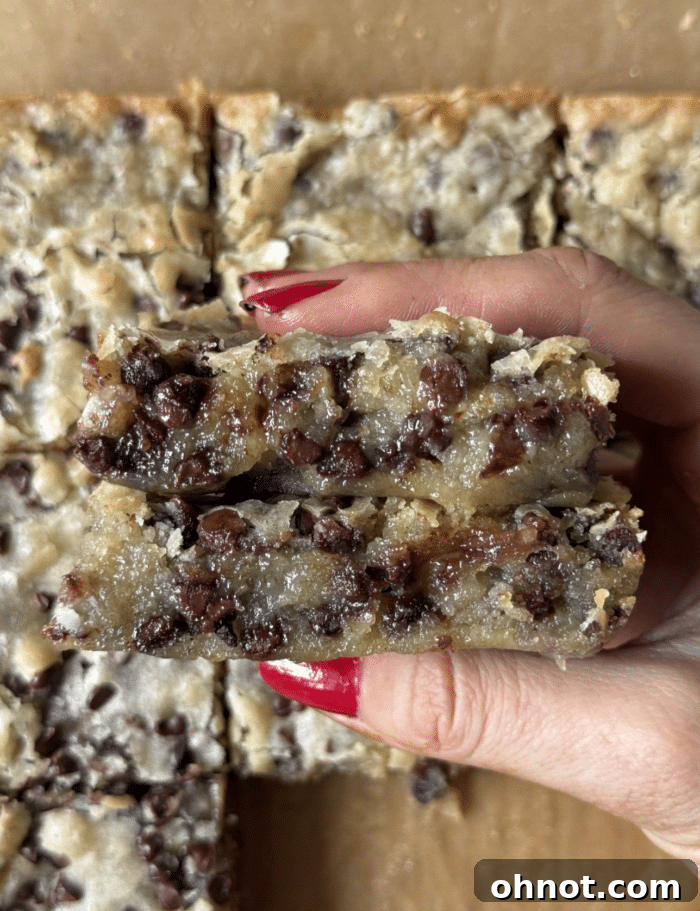Gooey bars in hands.