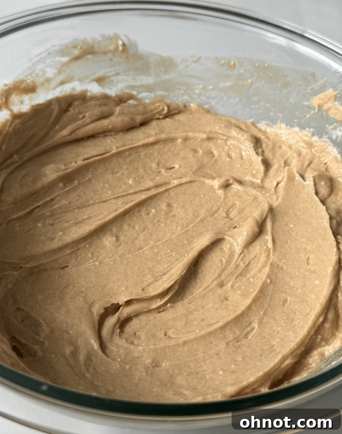 Thick batter in glass bowl.