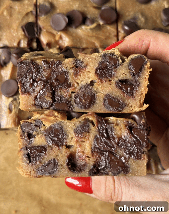 Hand with high protein blondies.