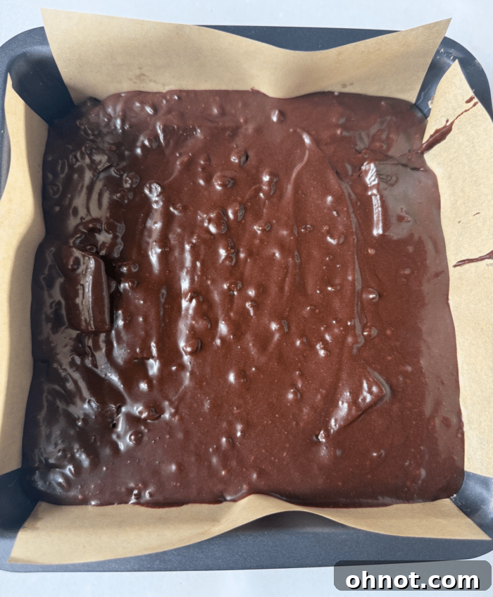 Dark batter in square pan.