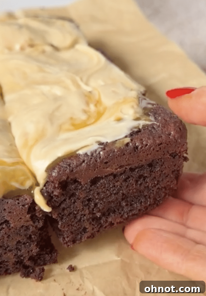 Hand with chocolate bar.