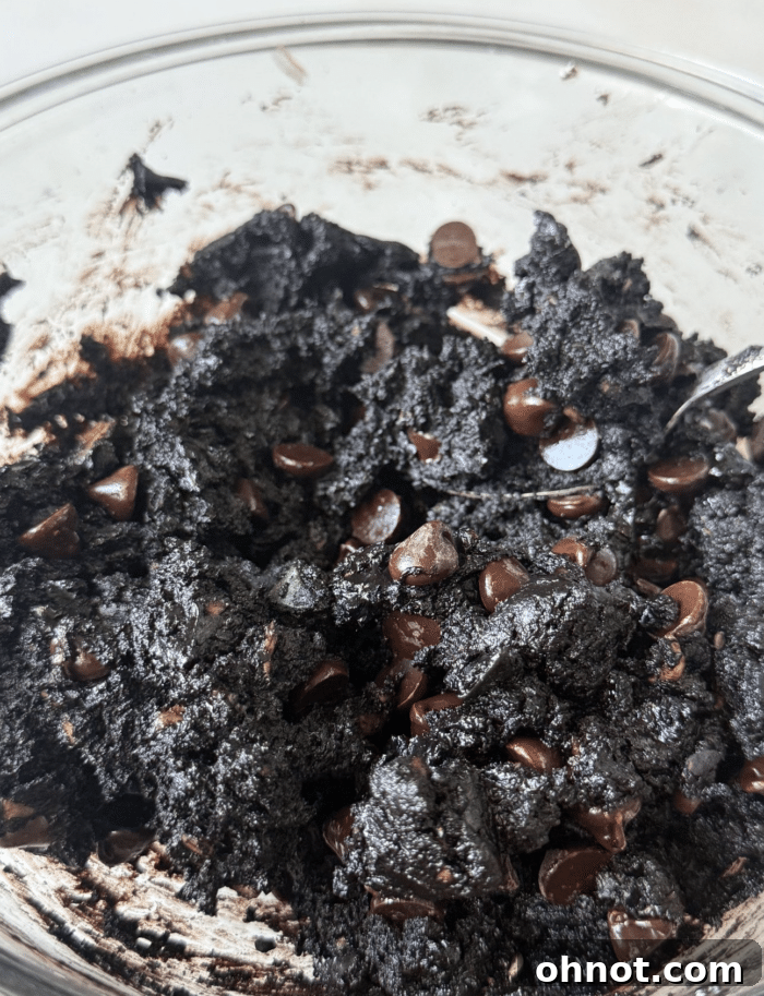 Brownie batter with veggies.