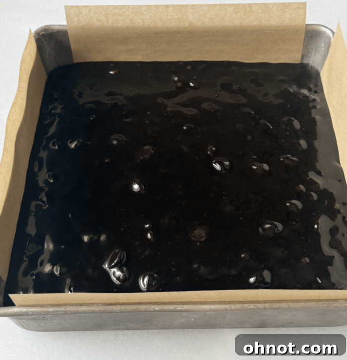 Dark batter in square pan.